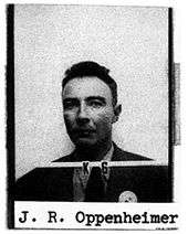 Mug shot with "J. R. Oppenheimer" typewritten below.