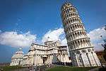 White church, leaning tower and a circular building.