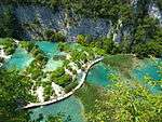 Turqois colored lakes among white rocks.