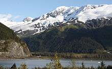 A view of a lake and the highway in the Portage Valley