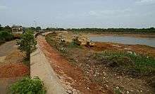 Repairing Puzhal bund roads in 2012