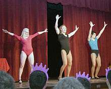 Three men wearing leotards