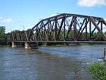 A typical steel truss railway bridge.