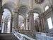 Sweeping marble staircase inside the Palace of Caserta