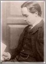 A small head-portrait of a young, pale man with dark hair.