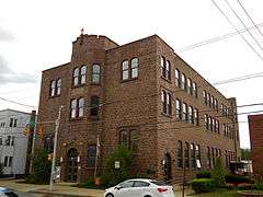 St. John the Evangelist Roman Catholic Church and School Building