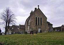 The east end of a stone which with a triple lancet window