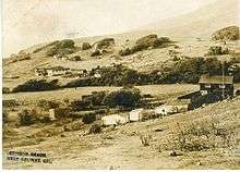 1916 photo postcard of Stinson Beach, showing Airey's Hotel to the left