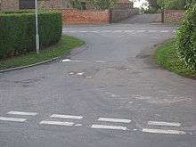 This short stretch of tarmac links Westend, Garthorpe to Station Road, Fockerby. The two villages were once separated by a course of the River Don which this road crosses. They were also in different counties, Garthorpe being in the Parts of Lindsey, Lincolnshire and Fockerby in the West Riding of Yorkshire. The two villages were joined with the creation of Humberside and were in Boothferry District. Since 1996 they are in North Lincolnshire.