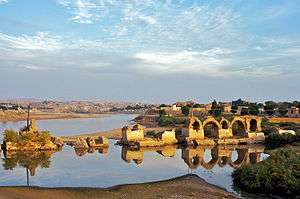 Ruins of a river bridge.