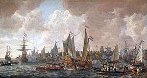 Seascape of vessels along a low-lying coastline