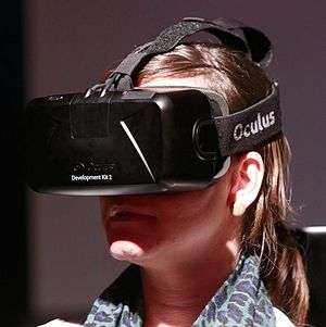 A woman wears Rift Development Kit 2 at Toekomst Festival