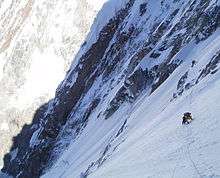 Traverse of the first ledge of Kunyang Chhish East.