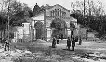 An ornate mausoleum built into a hillside