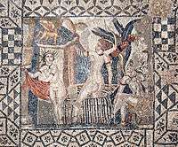 Top-down view of a square mosaic with a geometric border and a square inset showing Diana and her nymph surprised by Actaeon while bathing