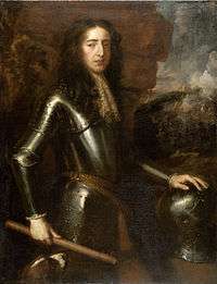 portrait of a man clad in armour, looking right