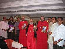 Smiling group of people holding icons