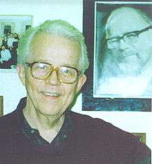 Benjamin Wright with a photo of Georg Rasch